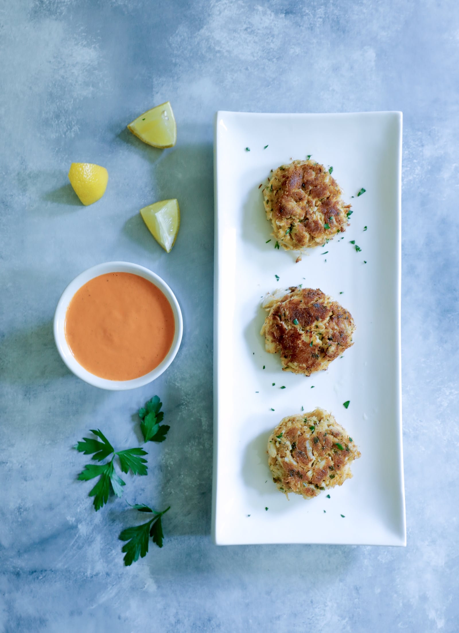 Keto crab cakes shown appetizer sized.