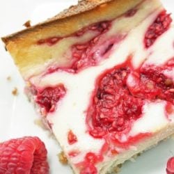 raspberry cheesecake bar with raspberry garnish