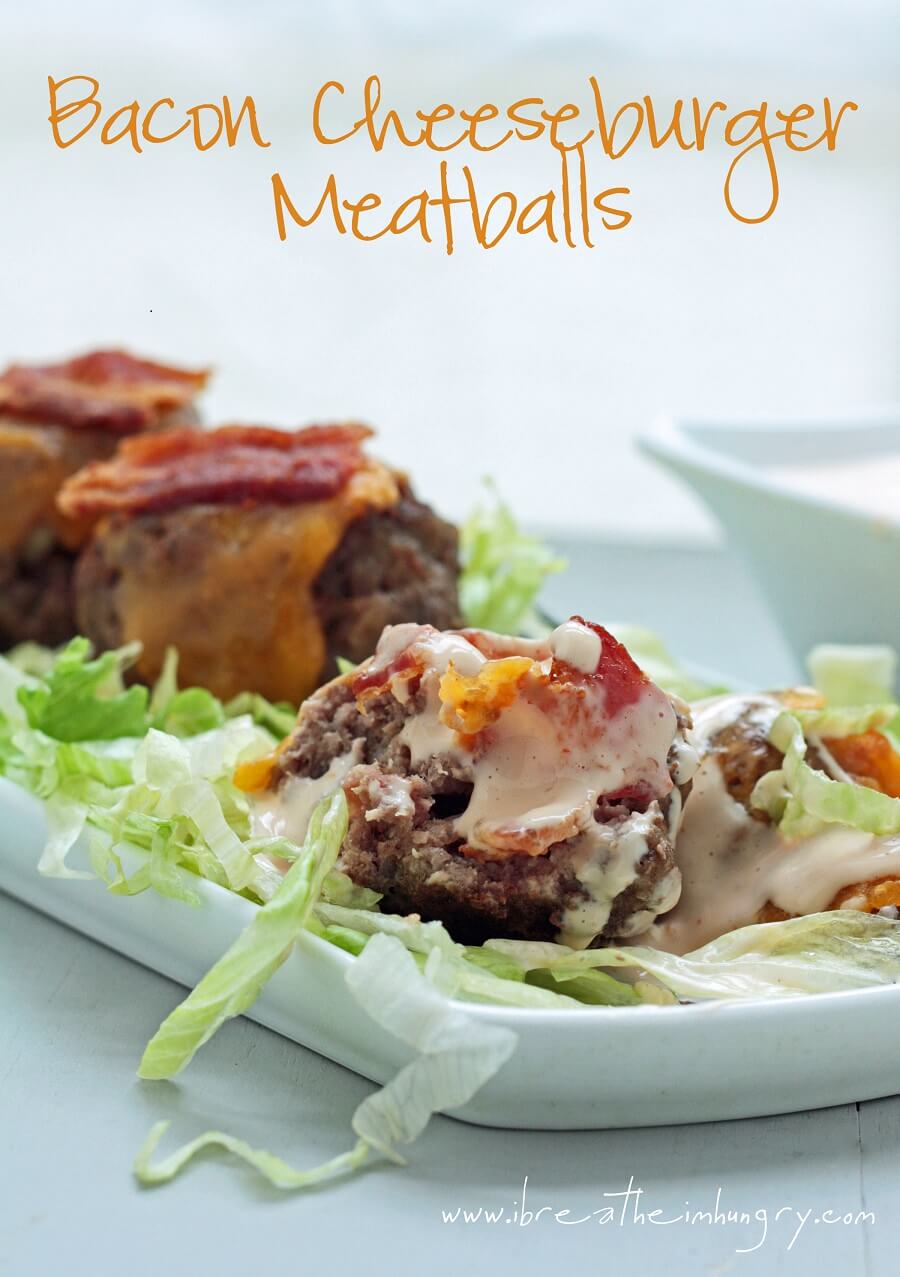Interior view of keto bacon cheeseburger meatballs on a bed of shredded lettuce with special sauce drizzled over the top. Hero shot with text.