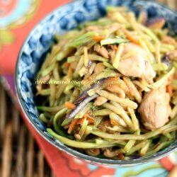 Keto chicken stir fry in a blue and white asian themed bowl with chopsticks