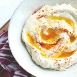 This low carb hummus is so delicious that you'd never know it was grain free and made with super healthy cauliflower! Keto, Atkins, and Paleo friendly! ibreatheimhungry.com