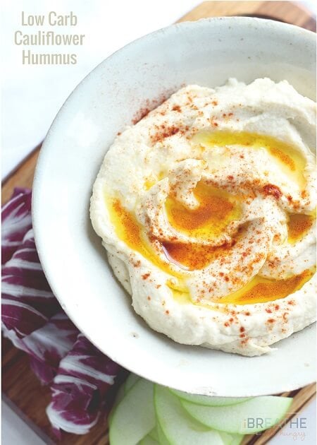 This low carb hummus is so delicious that you'd never know it was grain free and made with super healthy cauliflower! Keto, Atkins, and Paleo friendly! ibreatheimhungry.com