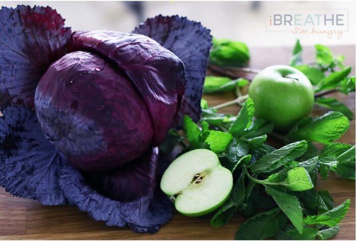 This Low Carb Red Cabbage, Mint, and Granny Smith Apple Slaw is not only gorgeous, it's also cheap, easy, super healthy for you, and tastes amazing! ibreathimhungry.com