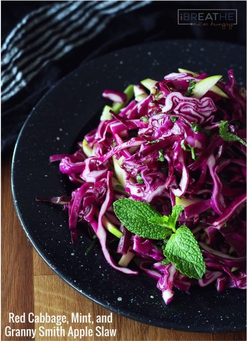 This Low Carb Red Cabbage, Mint, and Granny Smith Apple Slaw is not only gorgeous, it's also cheap, easy, super healthy for you, and tastes amazing! ibreathimhungry.com