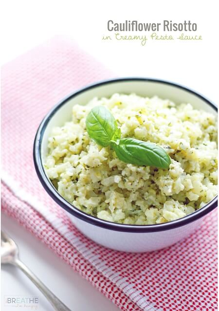 This versatile low carb side dish recipe perfectly mimics a classic risotto but is made with cauliflower in a cheesy pesto sauce. Keto and Atkins friendly.