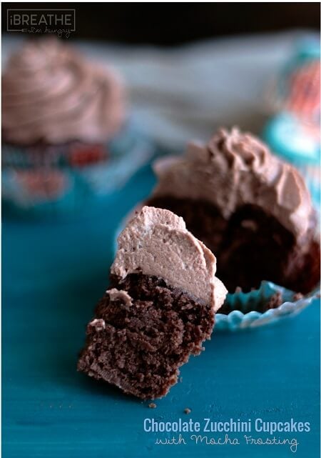Cross section of keto chocolate zucchini cupcake with mocha frosting