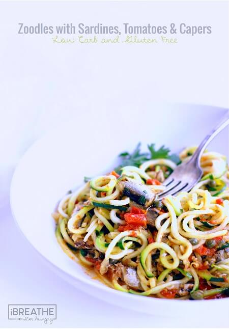 This low carb zucchini recipe contains super healthy sardines, garlic, tomatoes, capers and fresh herbs. Easy and delicious, it's also Paleo and Whole 30 approved!!