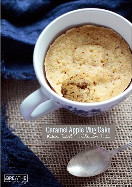 Keto Caramel Apple Mug Cake with a bite taken out of it.