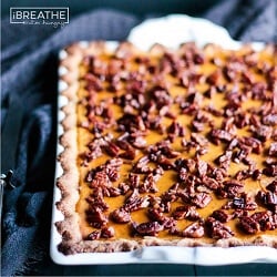 This low carb and gluten free pumpkin slab pie is my new favorite! The Cardamom Candied Pecans on top take it to the next level! Keto & Atkins friendly. From Mellissa Sevigny of I Breathe Im Hungry.