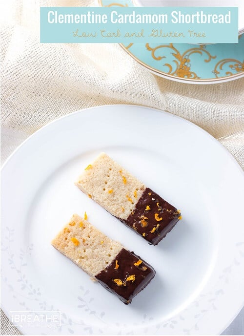 These delectable low carb shortbread cookies are flavored with cardamom and clementine zest, then dipped in dark chocolate! Gluten free too!