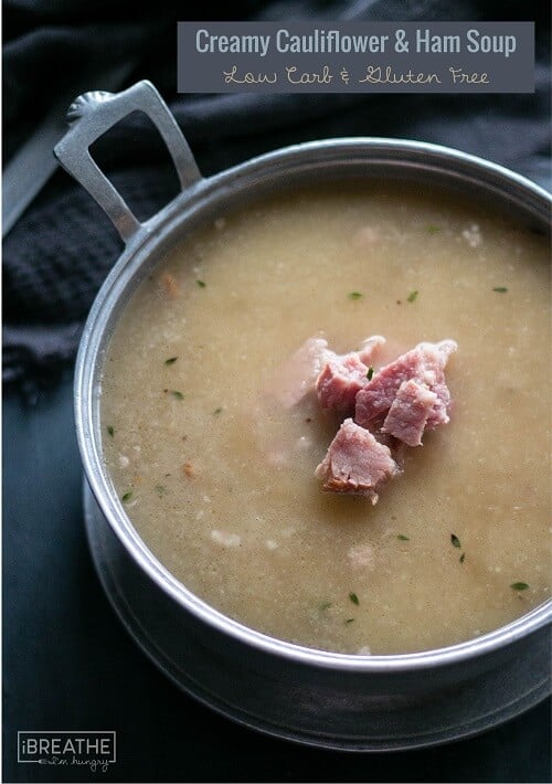 top view of keto cauliflower and ham soup garnished with chunks of chopped ham