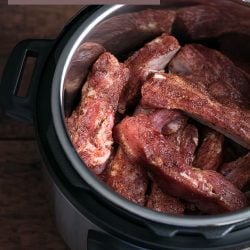 Layer your seasoned ribs in the Instant Pot