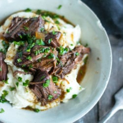 Keto Pot Roast in a white pottery bowl shot from above