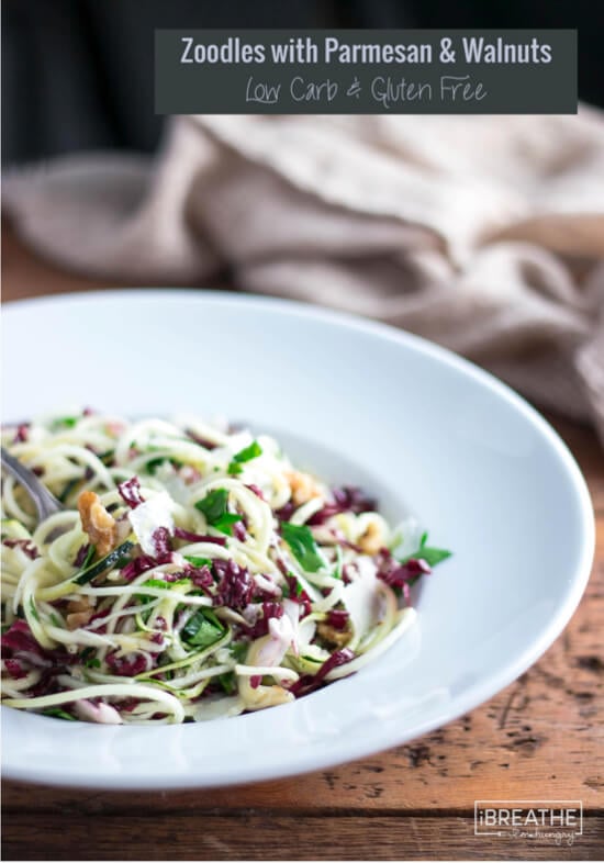 Both light and hearty, this zucchini noodle salad is loaded with parmesan, walnuts, radicchio and parsley with a light vinaigrette!
