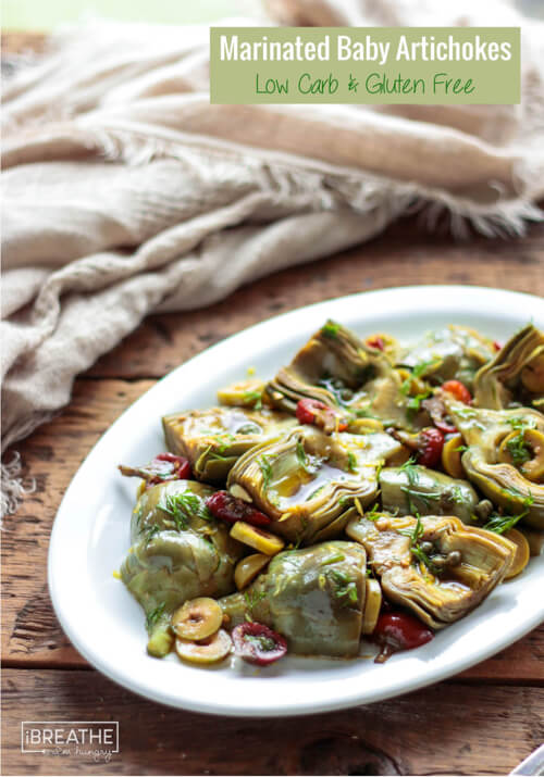 This low carb baby artichoke salad is loaded with bright flavors and will class up any antipasto platter!