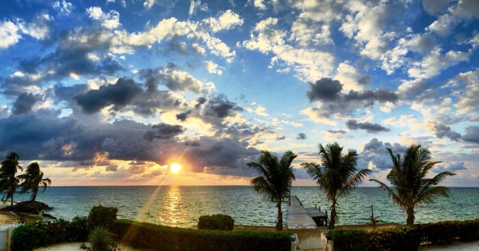 sunrise over the caribbean in belize taken by Mellissa Sevigny of I Breathe Im Hungry