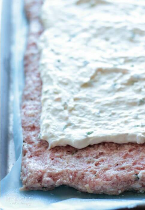 A tasty pork meatloaf stuffed with jalapeño popper filling