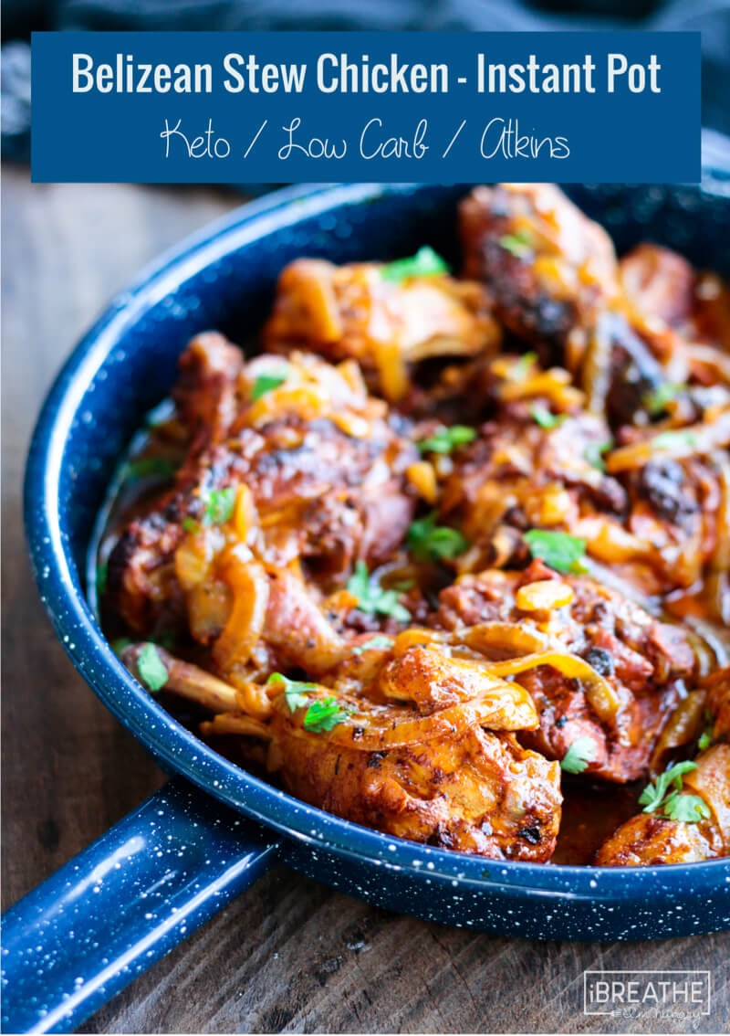 Belizean stew chicken on a cobalt blue enamel plate