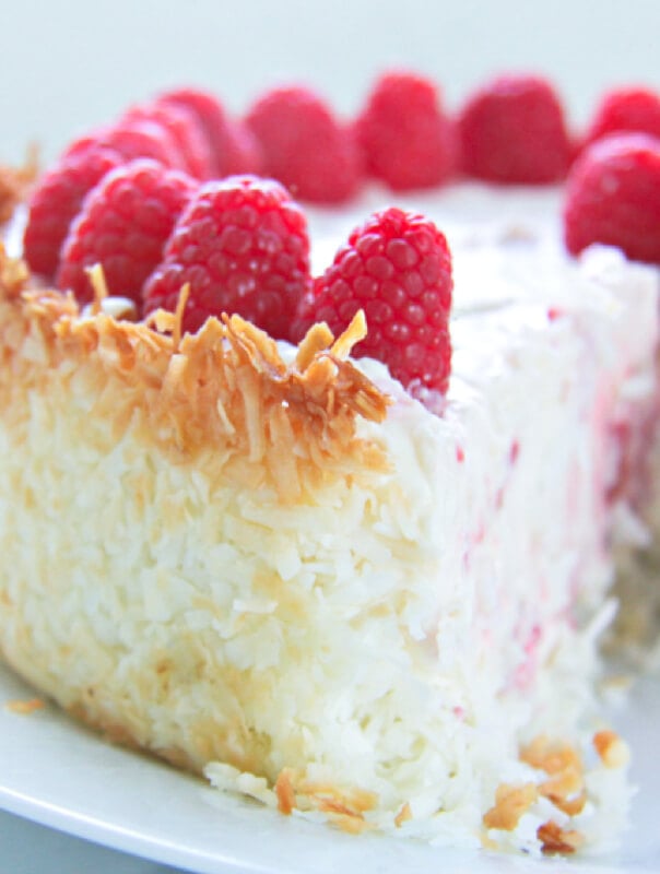 A gorgeous no bake keto raspberry cheesecake recipe with a hint of lemon and a coconut macaroon crust!