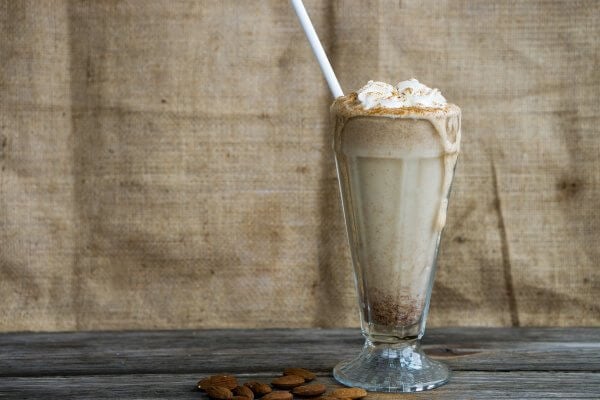 Keto cinnamon almond butter breakfast shake in a tall glass