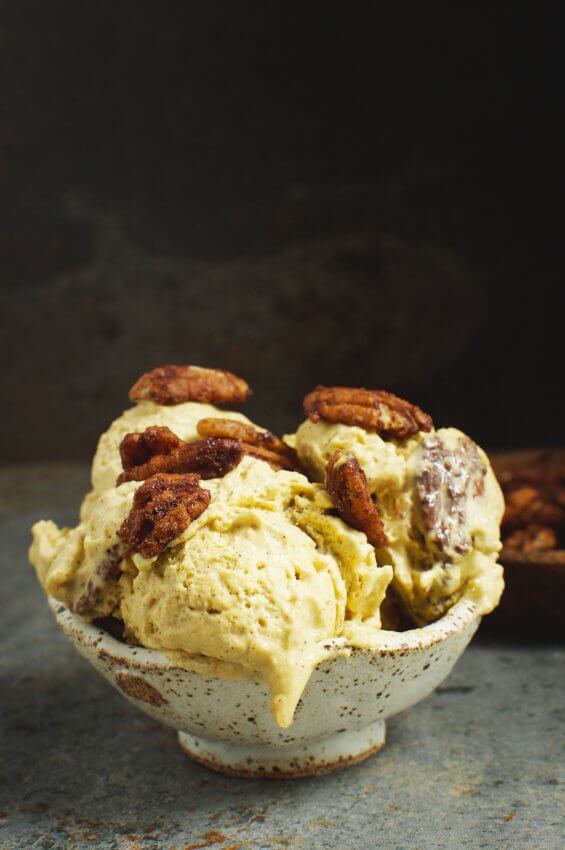 bowl of pumpkin ice cream with candied pecans
