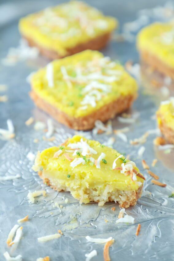 Keto Coconut Lime Bars with a bite taken out.