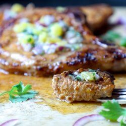 Keto Pork Chops al Pastor - one bite on a fork