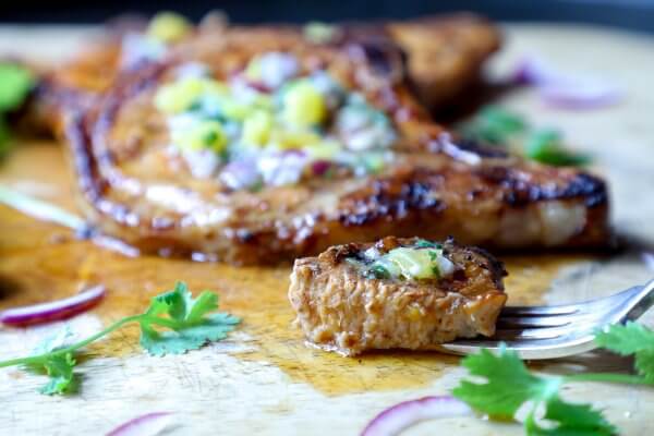 Keto Pork Chops al Pastor - one bite on a fork