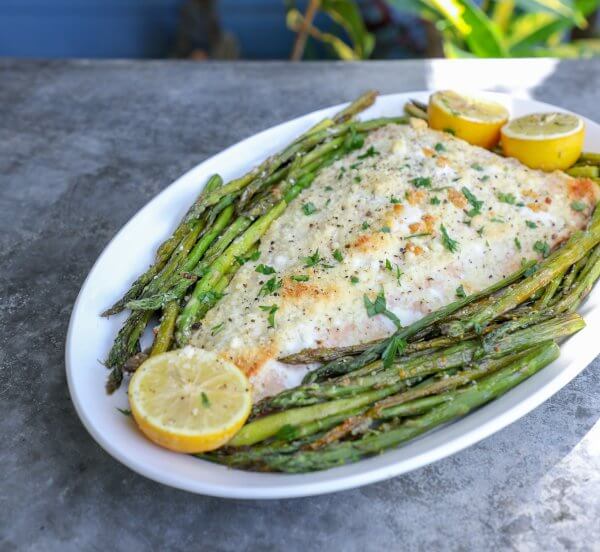 Keto Sheet Pan Salmon and Asparagus on a white platter