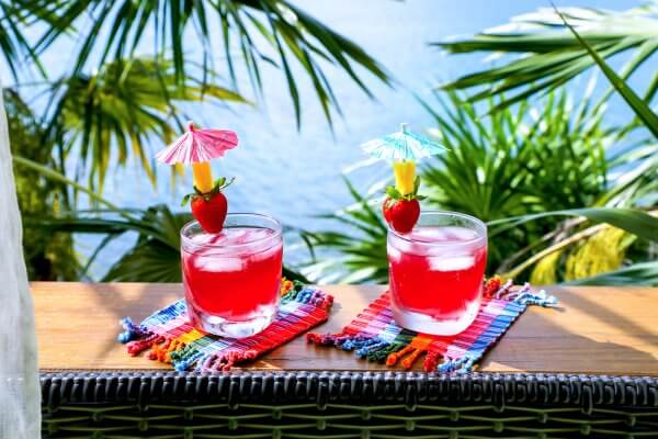Easy Keto Rum Punch on deck railing