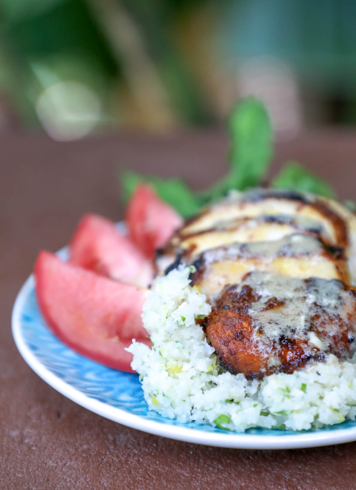 Easy Keto Chicken Shawarma on a red concrete background