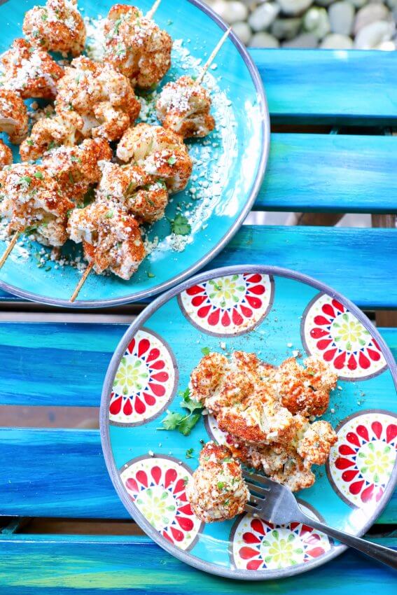 Keto Mexican Cauliflower on blue plate with red flowers