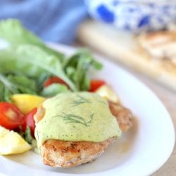 Keto Chicken & Creamy Dill Sauce on a white platter with salad