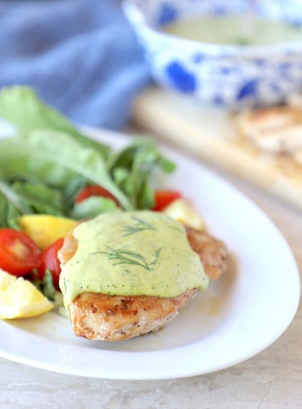 Keto Chicken & Creamy Dill Sauce on a white platter with salad