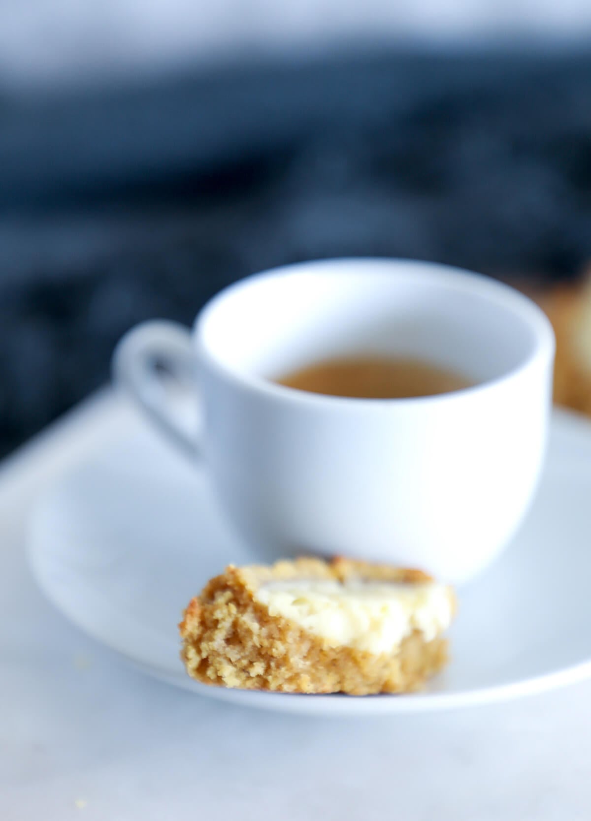 Keto Pumpkin Cheesecake Thumbprint cookies served with coffee in a white mug