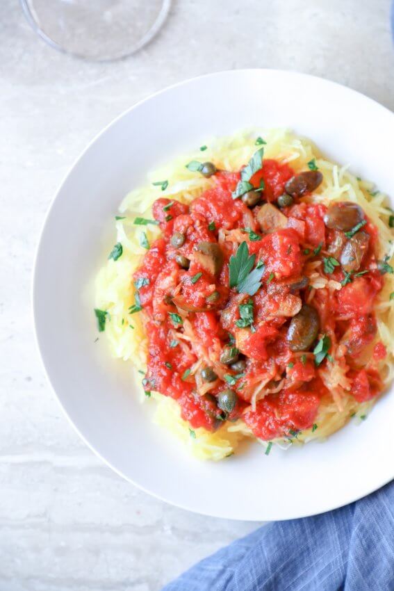 Keto Spaghetti Squash Puttanesca in a white bowl from above