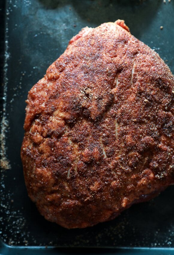 Keto Beef Brisket in the Instant Pot on a cookie sheet, seasoned but still raw