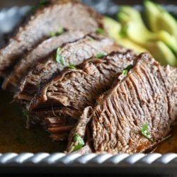 Keto Beef Brisket in the Instant Pot sliced with avocado garnish