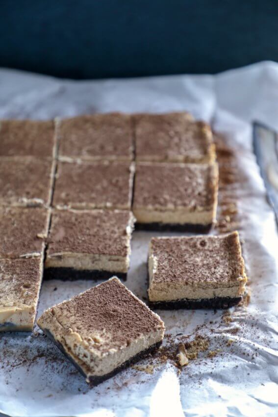 keto espresso chocolate cheesecake bars on parchment
