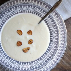 Instant Pot Keto Cheesy Cauliflower Soup with fried garlic garnish