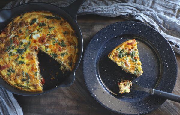 Keto sausage frittata SCKC on a wooden cutting board