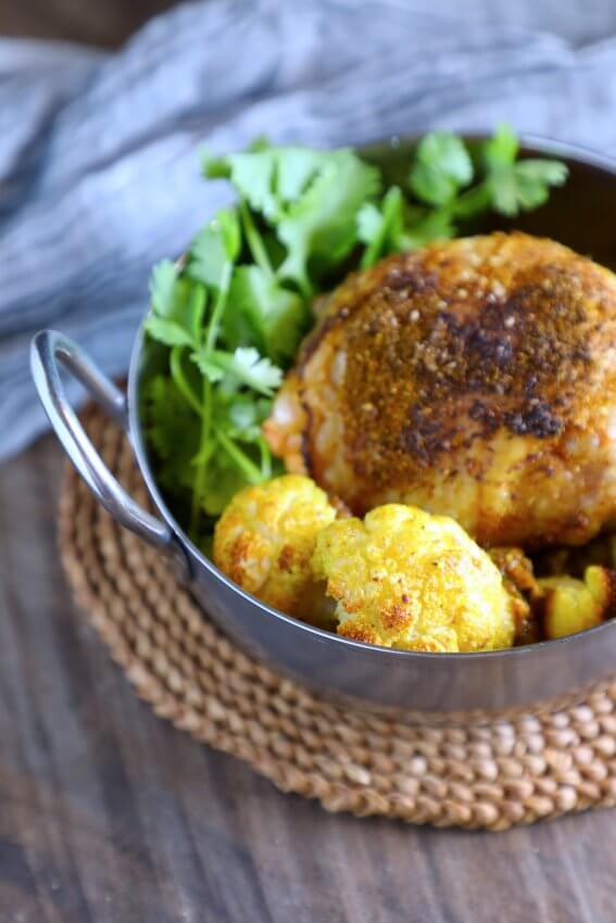 Keto sheet pan curried chicken - SCKC in a metal bowl with handles
