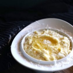 Cheesy Keto Polenta front view garnished with grated parmesan cheese