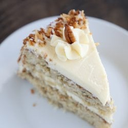 Slice of Keto Hummingbird Cake on a white plate top view