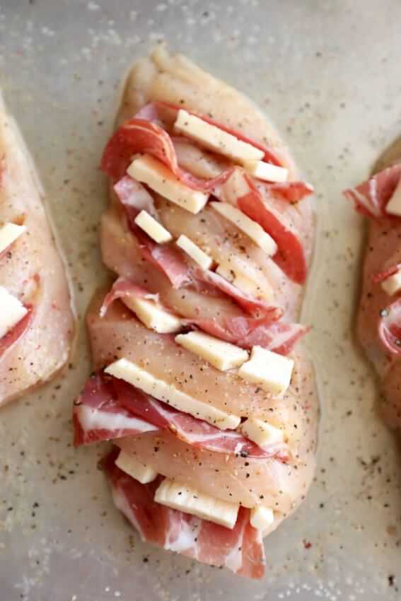 Keto Hasselback Chicken on a sheet pan still raw