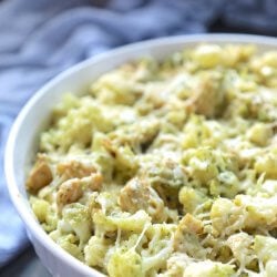 Keto Chicken Pesto Cauliflower Casserole in a white casserole dish