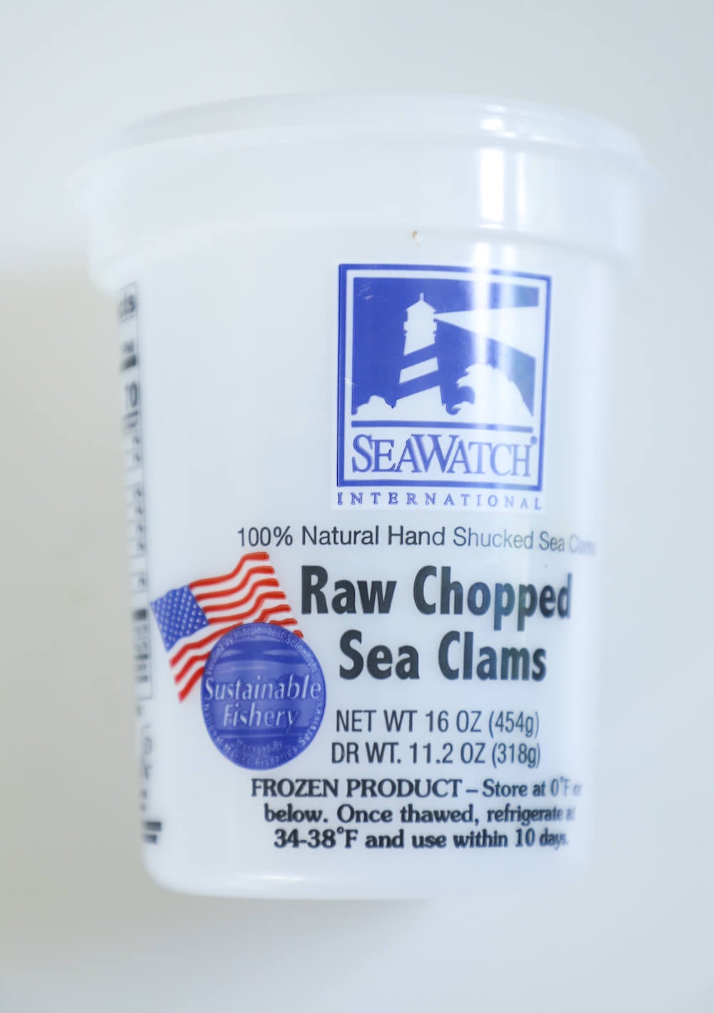 Empty container of raw clams used in this keto clam chowder