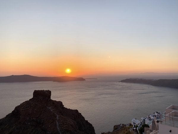 IBIH Vacation Travel Guide to Santorini - Sunset over Skaros Rock Imerovigli
