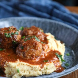 Side view of Keto Shepherd's Pie Meatballs over cauliflower puree