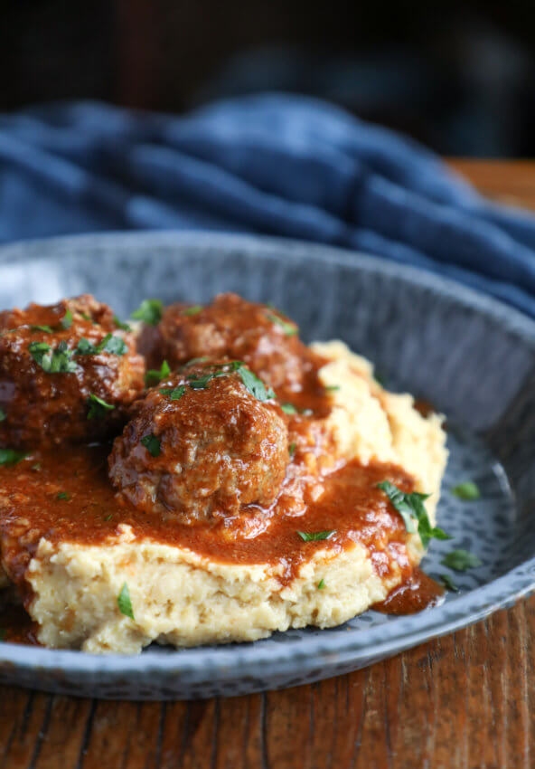 Side view of Keto Shepherd's Pie Meatballs over cauliflower puree